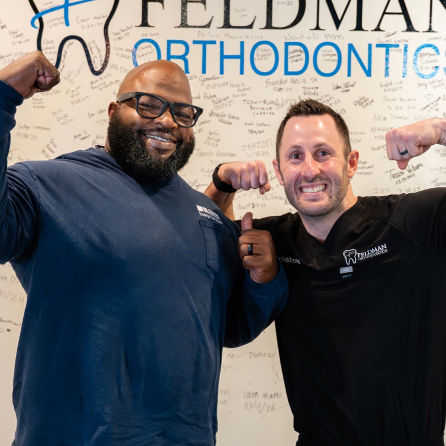 adult patient laughing with Dr. Feldman
